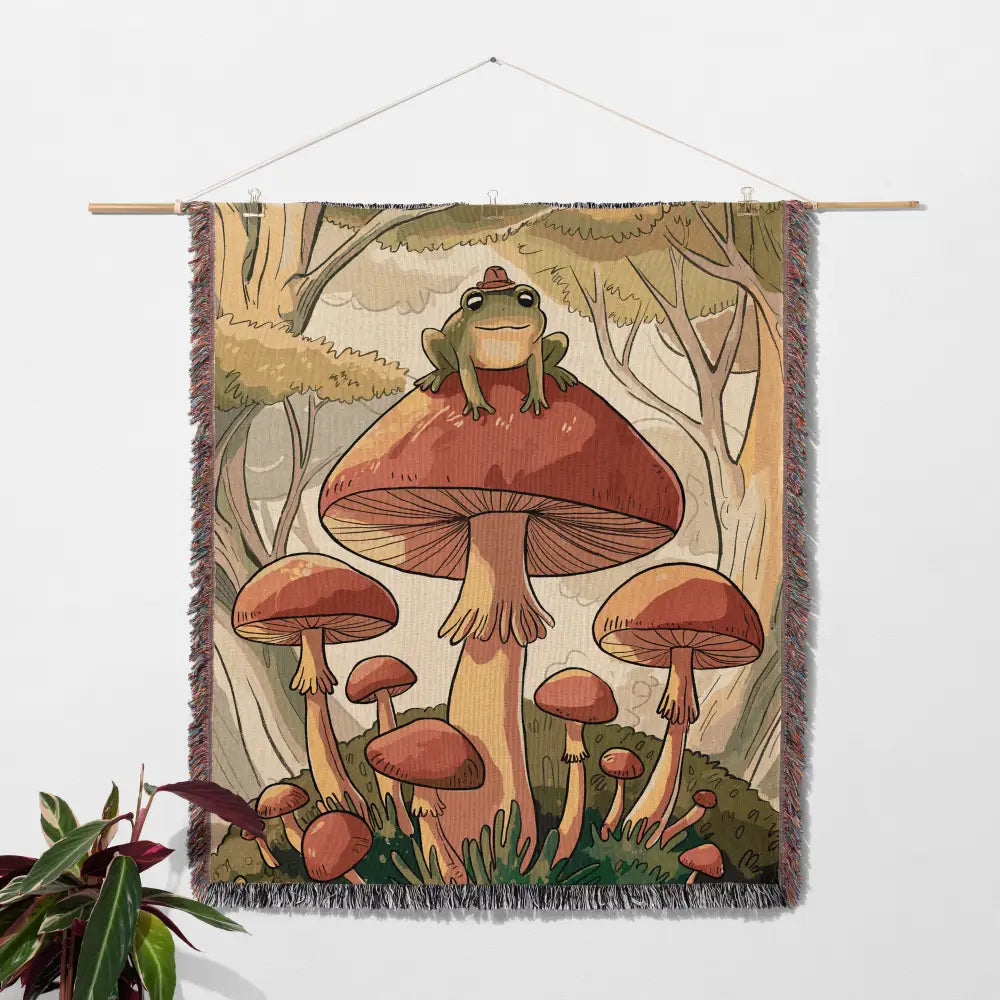 Woven tapestry of a frog on a mushroom for custom woven blankets collection